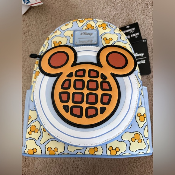 Loungefly Handbags - Loungefly Disney Mickey Mouse Waffle Backpack - Yellow and Blue
